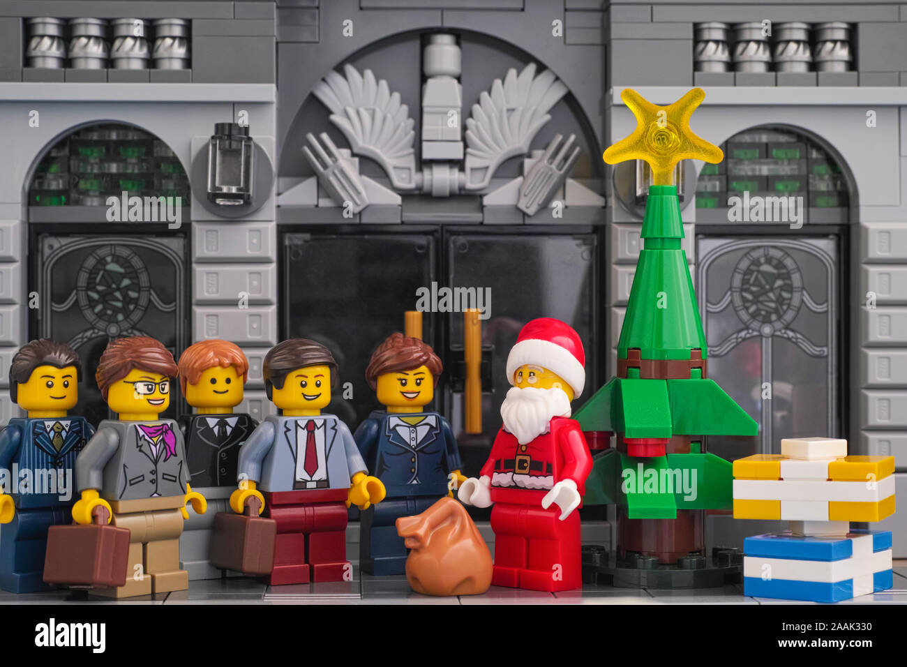 Tambov, Russian Federation - November 21, 2019 Lego Santa Claus giving gifts to businessmen. Stock Photo