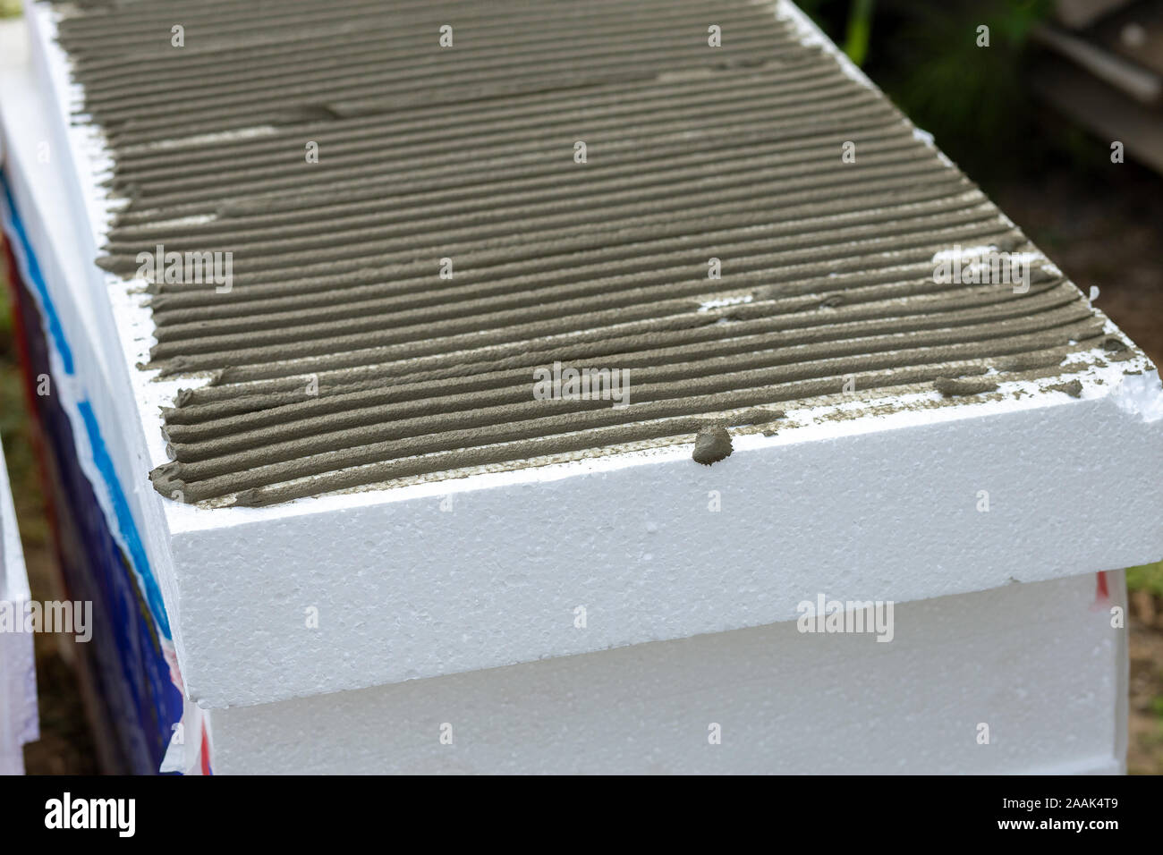 Insulation of facade wall with styrofoam sheets. Polystyrene insulation