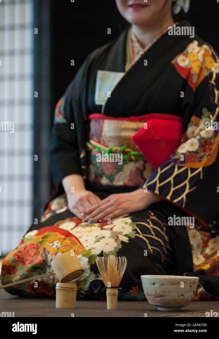 Japanese Woman In Traditional Kimono During The Tea Ceremony Stock japanese-woman-in-traditional-kimono-during-the-tea-ceremony-stock