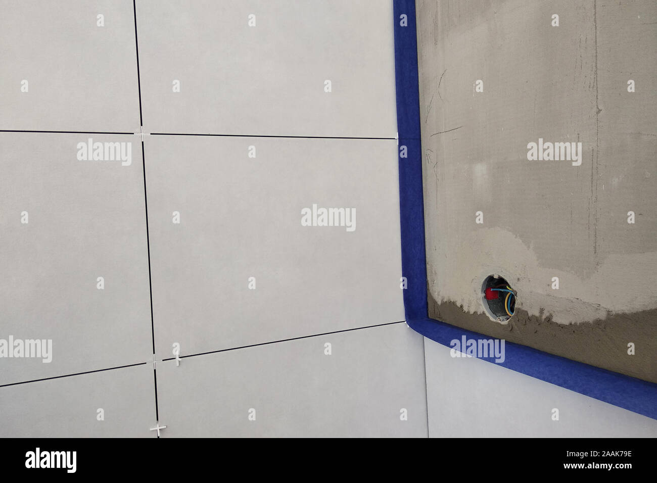 Wall ceramic tiles installation on mortar glue Stock Photo Alamy