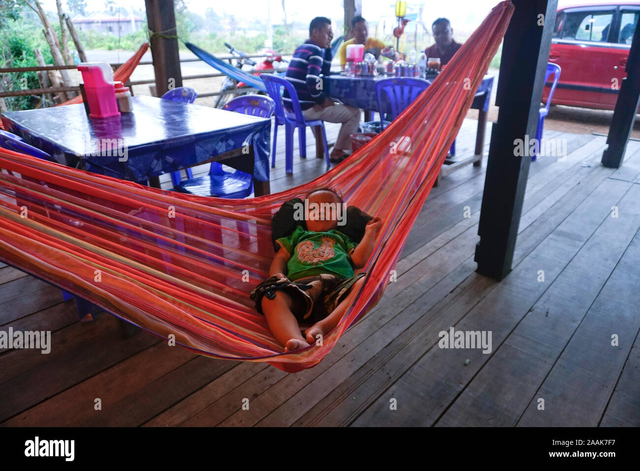 Baby sleeping in hammock hires stock photography and images Alamy