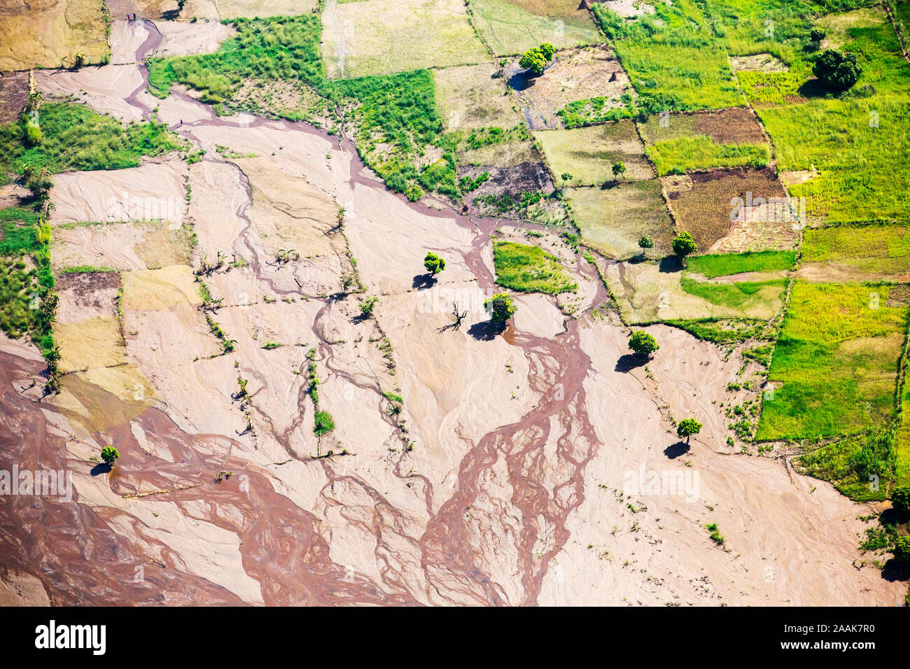 Crops and precious soil washed away by the Malawi floods. Stock Photo