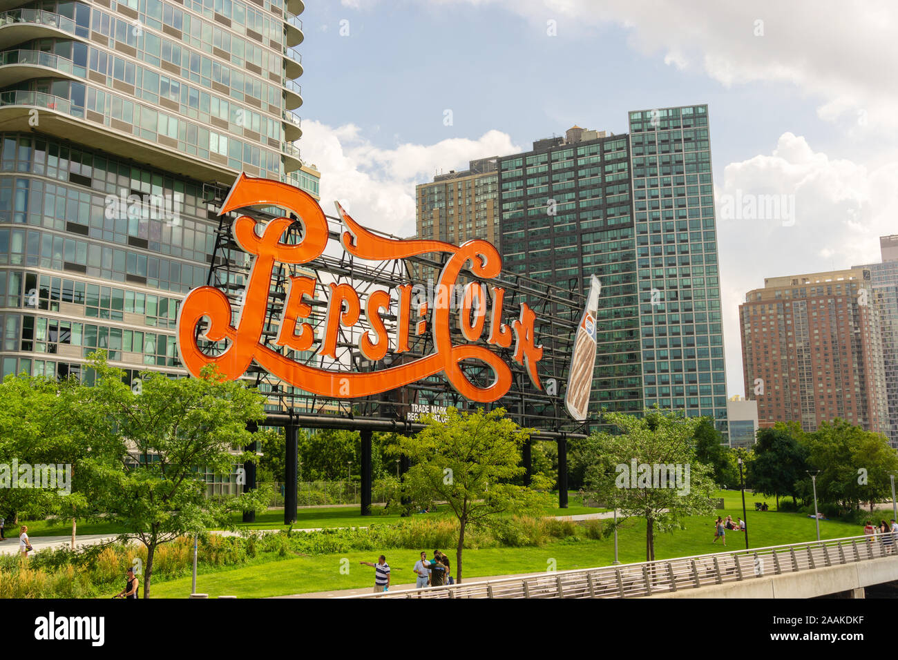 New York, USA - August 20, 2018: Long Island City waterfront with landmark Pepsi Cola sign located at Gantry Plaza State Park in Queens Stock Photo