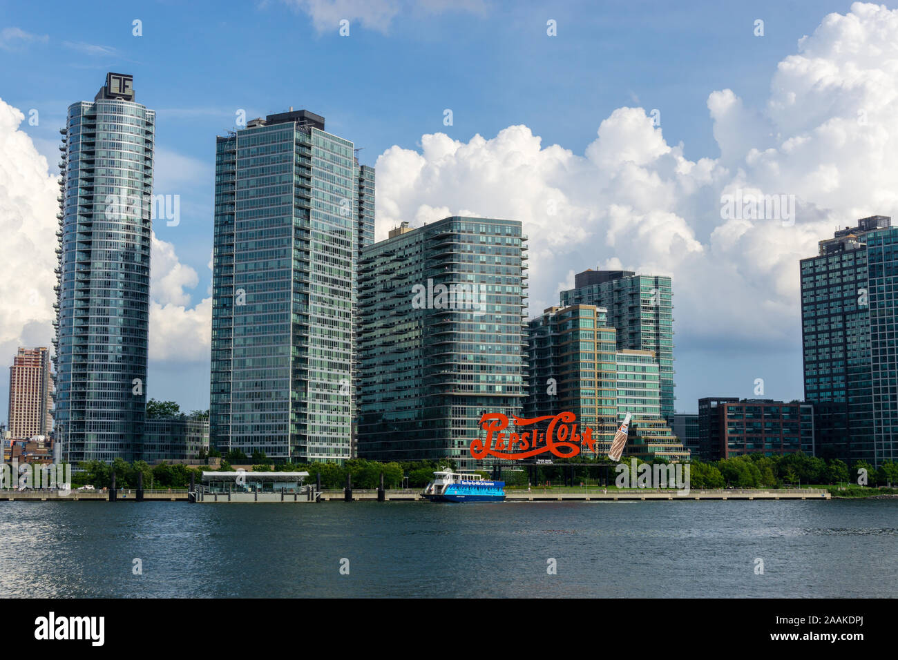 New York, USA - August 20, 2018: Long Island City waterfront with landmark Pepsi Cola sign located at Gantry Plaza State Park in Queens Stock Photo