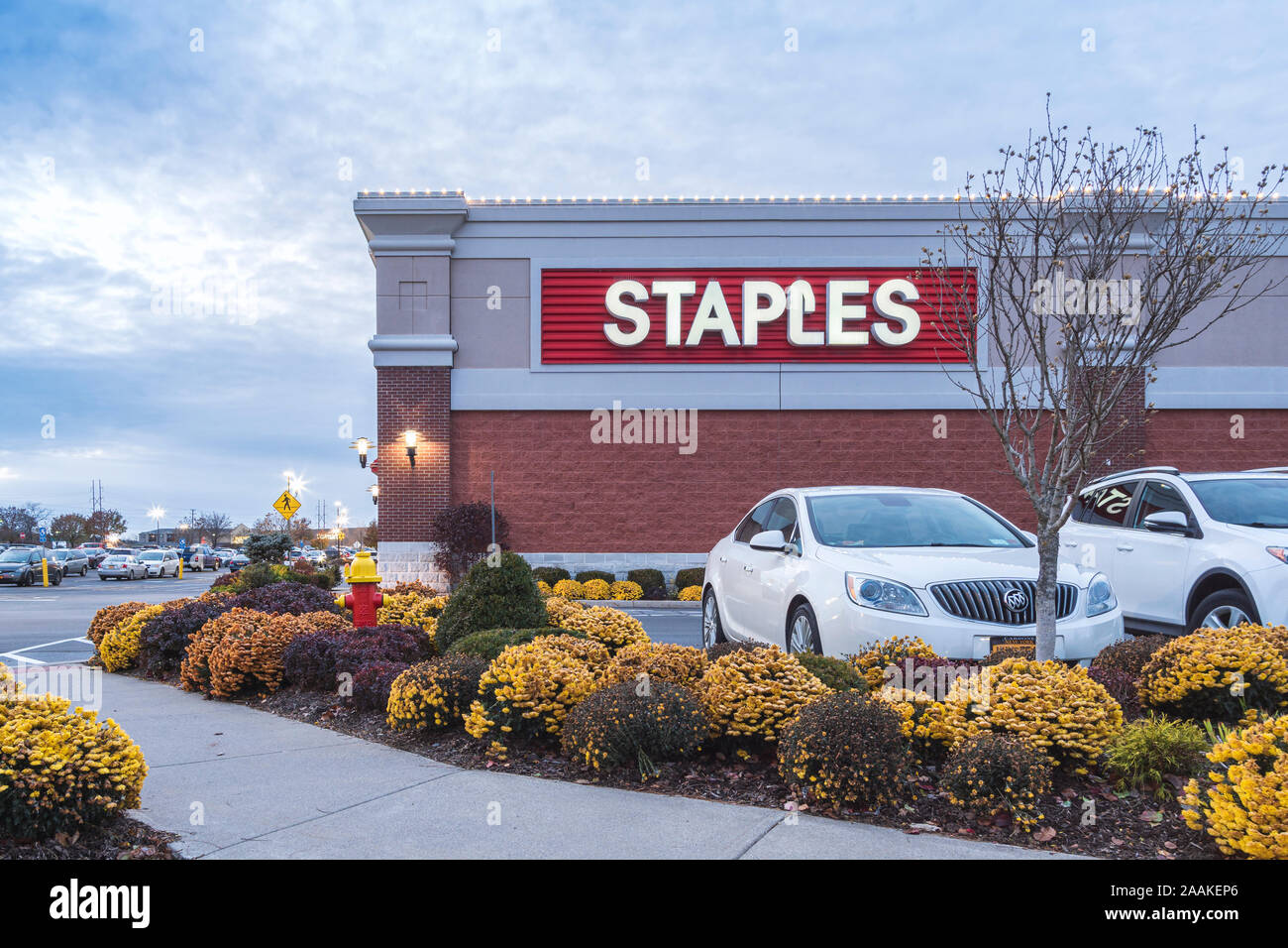 New Hartford, New York - Nov 10, 2019: Staples is an American office retail company, involved in the sale of office supplies and related products chai Stock Photo