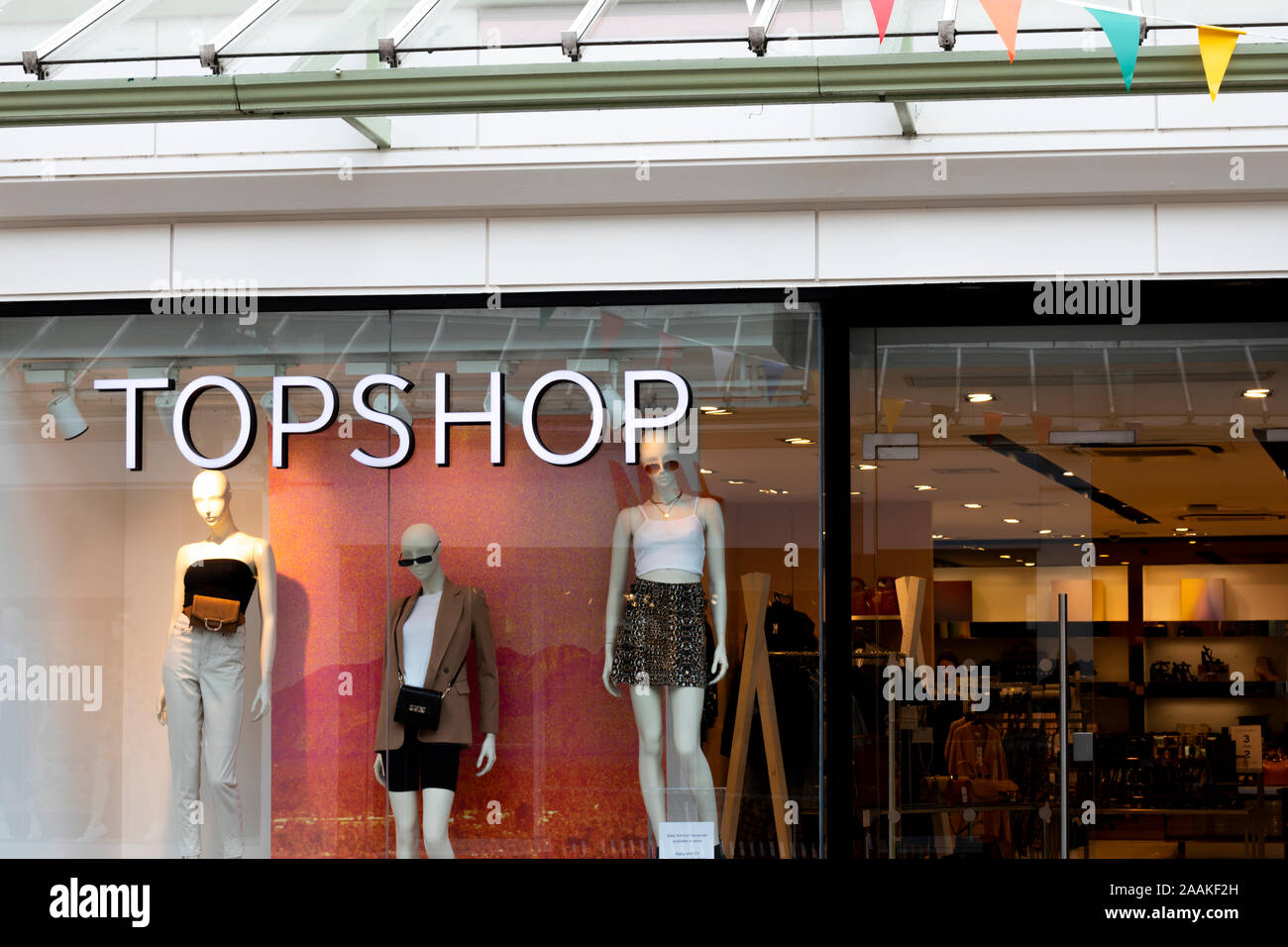 ladies high street fashion store sign and window display, part