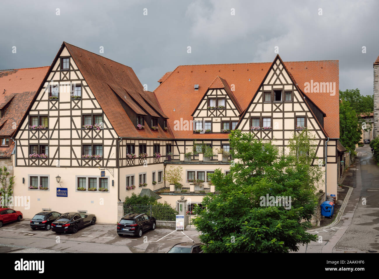 View of the Prinzhotel Rothenburg, from the city wall. Traditional half- timbered buildings with tile roofs in Rothenburg ob der Tauber, Germany. Stock Photo