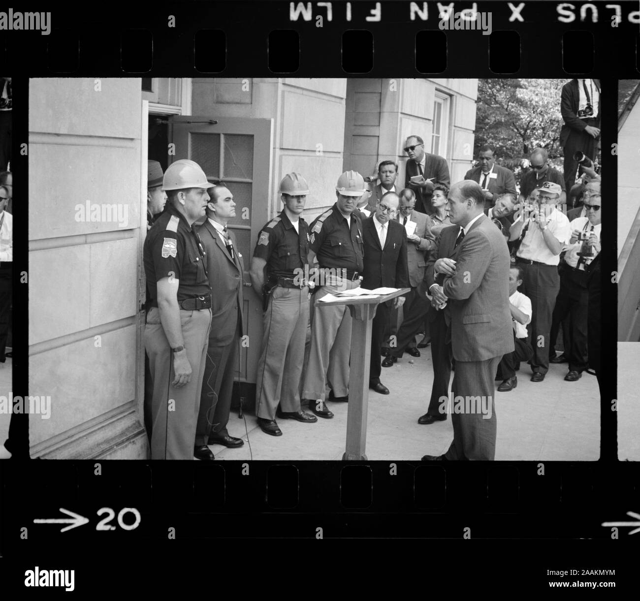 Governor George Wallace attempting to block Integration by standing defiantly at Door while being confronted by Deputy U.S. Attorney General Nicholas Katzenbach, University of Alabama, Tuscaloosa, Alabama, USA, photograph by Warren K. Leffler, June 11, 1963 Stock Photo