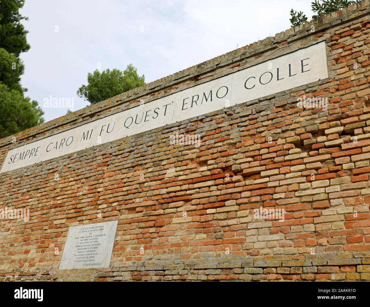 Recanati, MC, Italy - November 2, 19: famous wall of poet Giacomo Leopardi with text of his poem called INFINITO that means Always dear to me was this Stock Photo