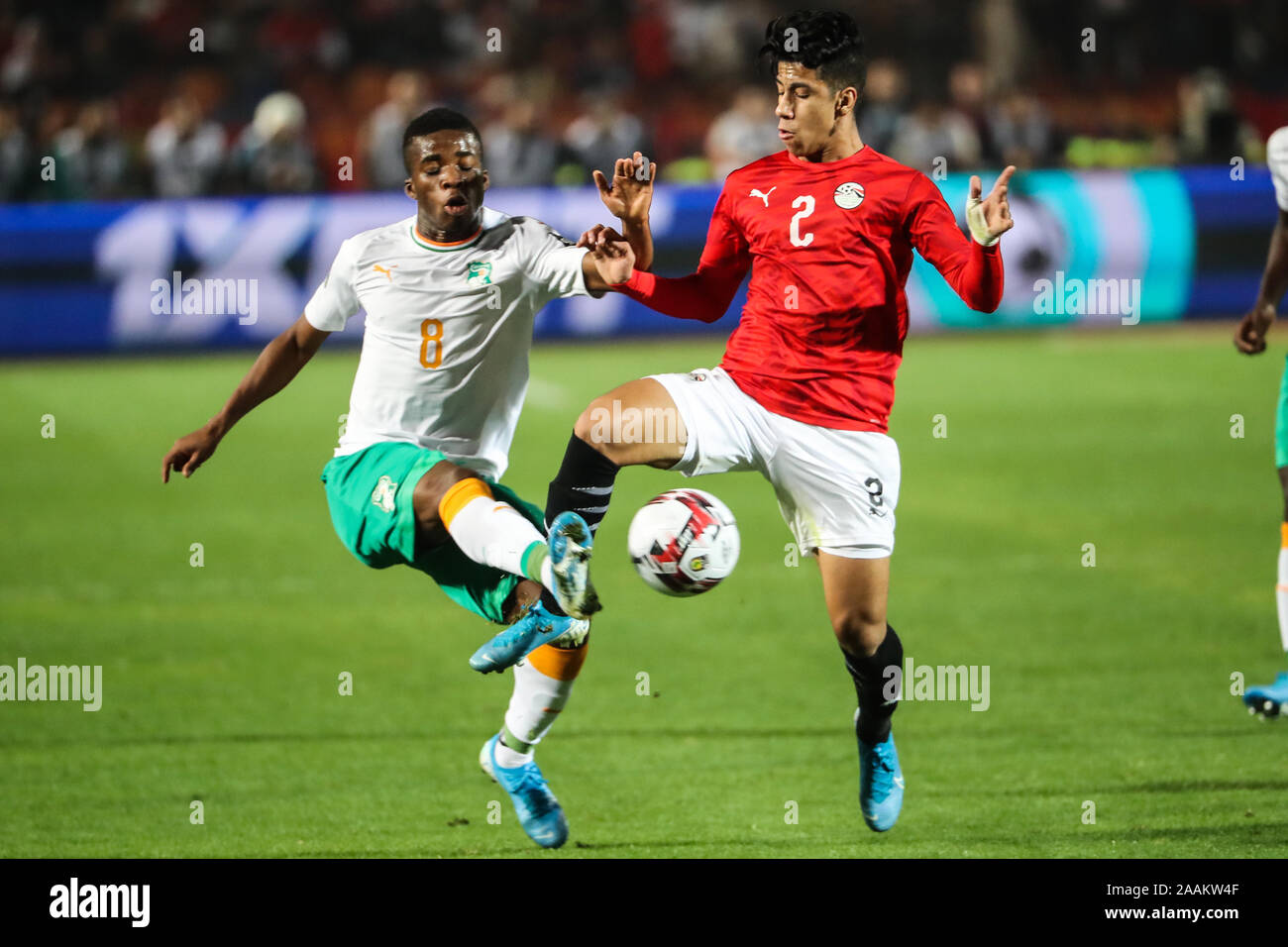 Cairo, Egypt. 22nd Nov, 2019. Egypt's Amar Hamdy (R) and Cote d'Ivoire's  Hamed Junior Traore battle for the ball during the Africa U-23 Cup of  Nations final soccer match between Egypt and
