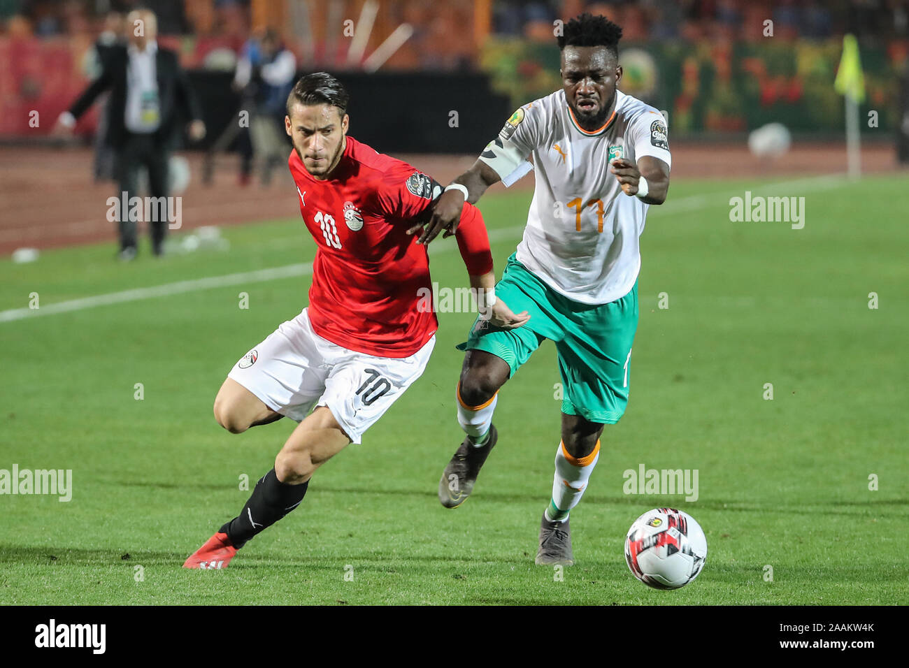 Cairo, Egypt. 22nd Nov, 2019. Egypt's Ramadan Sobhi (L) and Cote d'Ivoire's Diallo Ismael battle for the ball during the Africa U-23 Cup of Nations final soccer match between Egypt and Ivory Coast at the Cairo International Stadium. Credit: Omar Zoheiry/dpa/Alamy Live News Stock Photo
