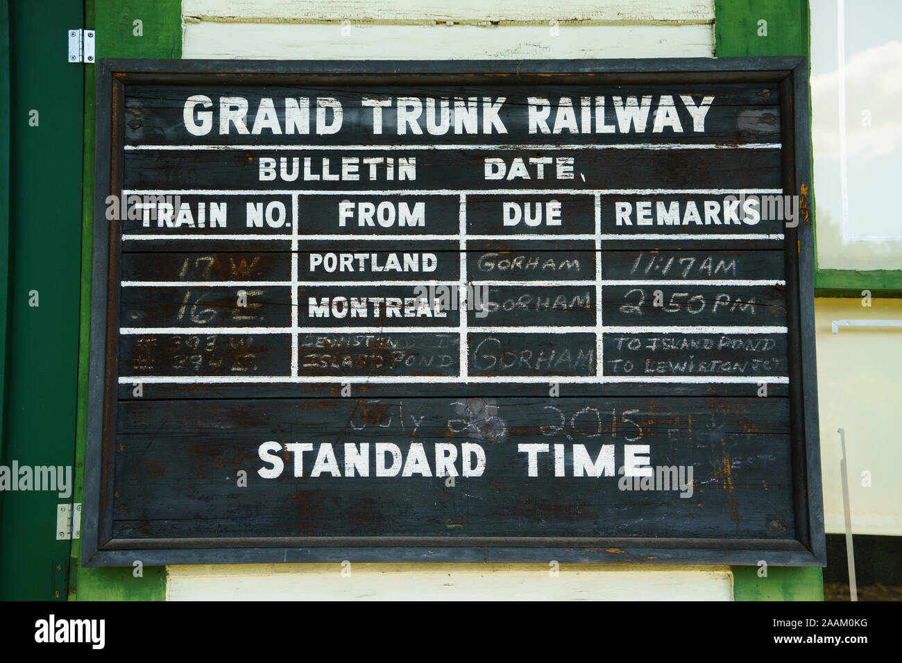 Antique blackboard style Grand Trunk National Railway train timetable. Stock Photo