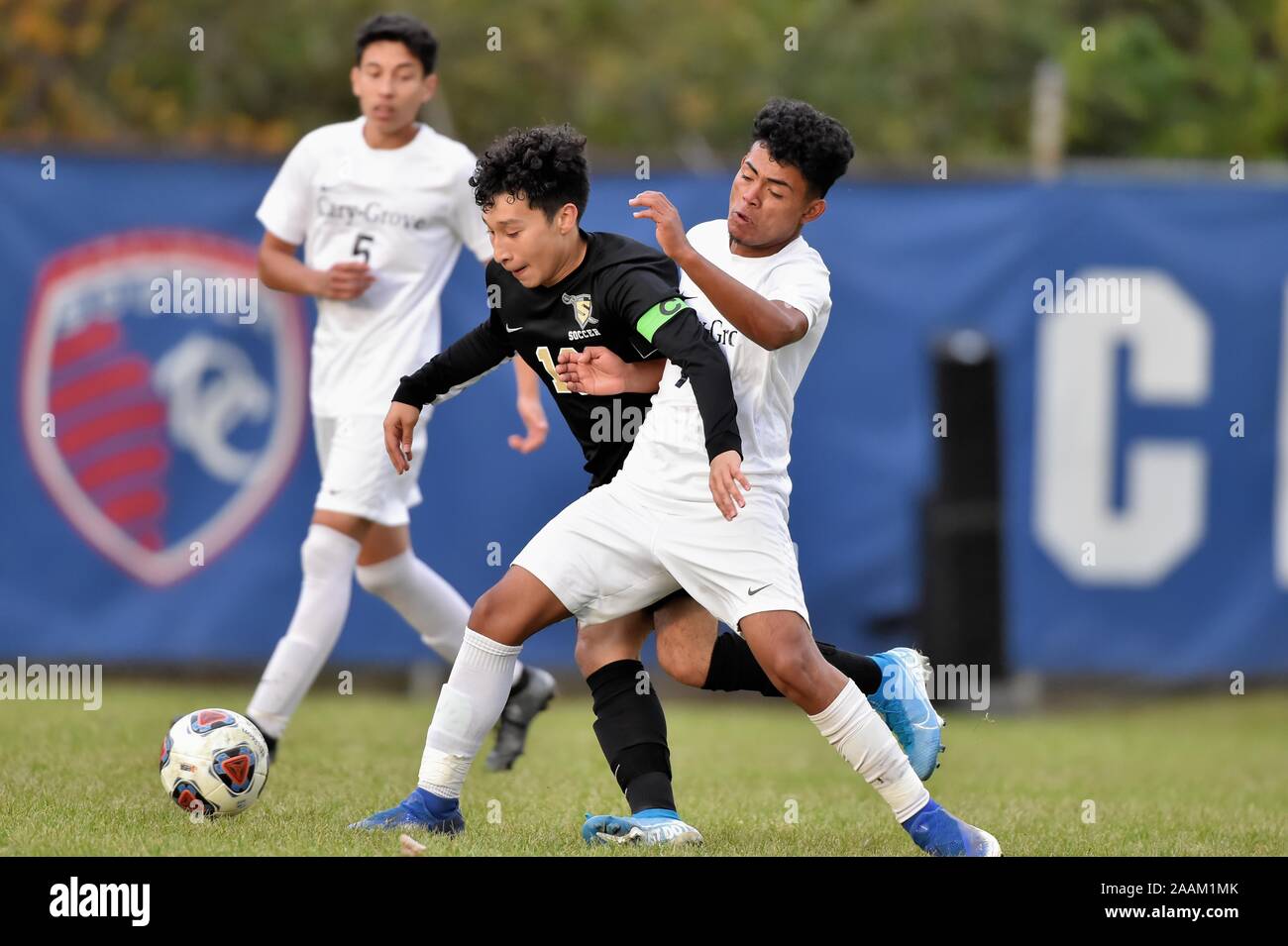 Opposing players battle for possession of the ball. USA. Stock Photo