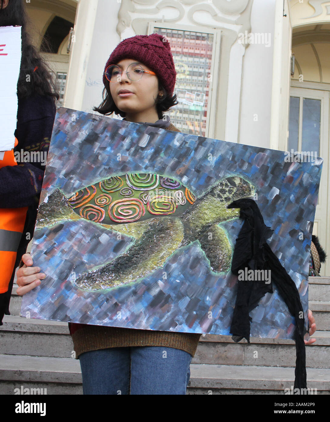 A youth holds a placard during the demonstration.Youth for climate Tunisia organised climate strikes in Tunis. Recently, Tunisia has been afflicted with devastating floods and yet their government has no plan to lead the country towards a carbon neutral future. The youth are fighting to change this! Stock Photo