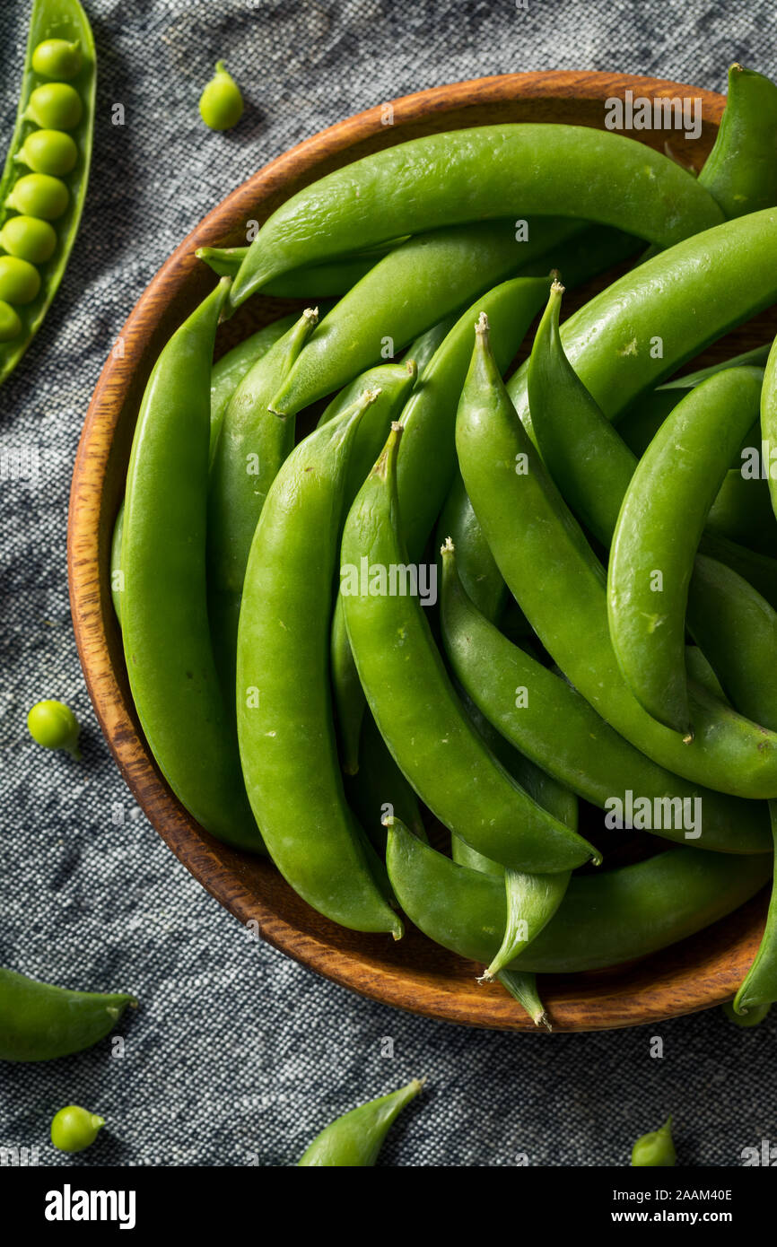 Raw Green Organic Sugar Snap Peas in a Bunch Stock Photo Alamy