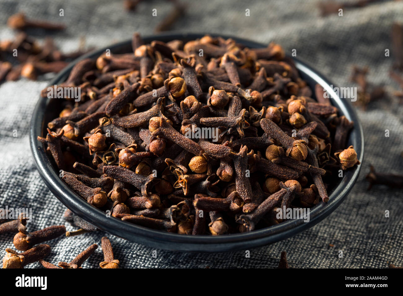 Dry Organic Clove Spice in a Bowl Stock Photo