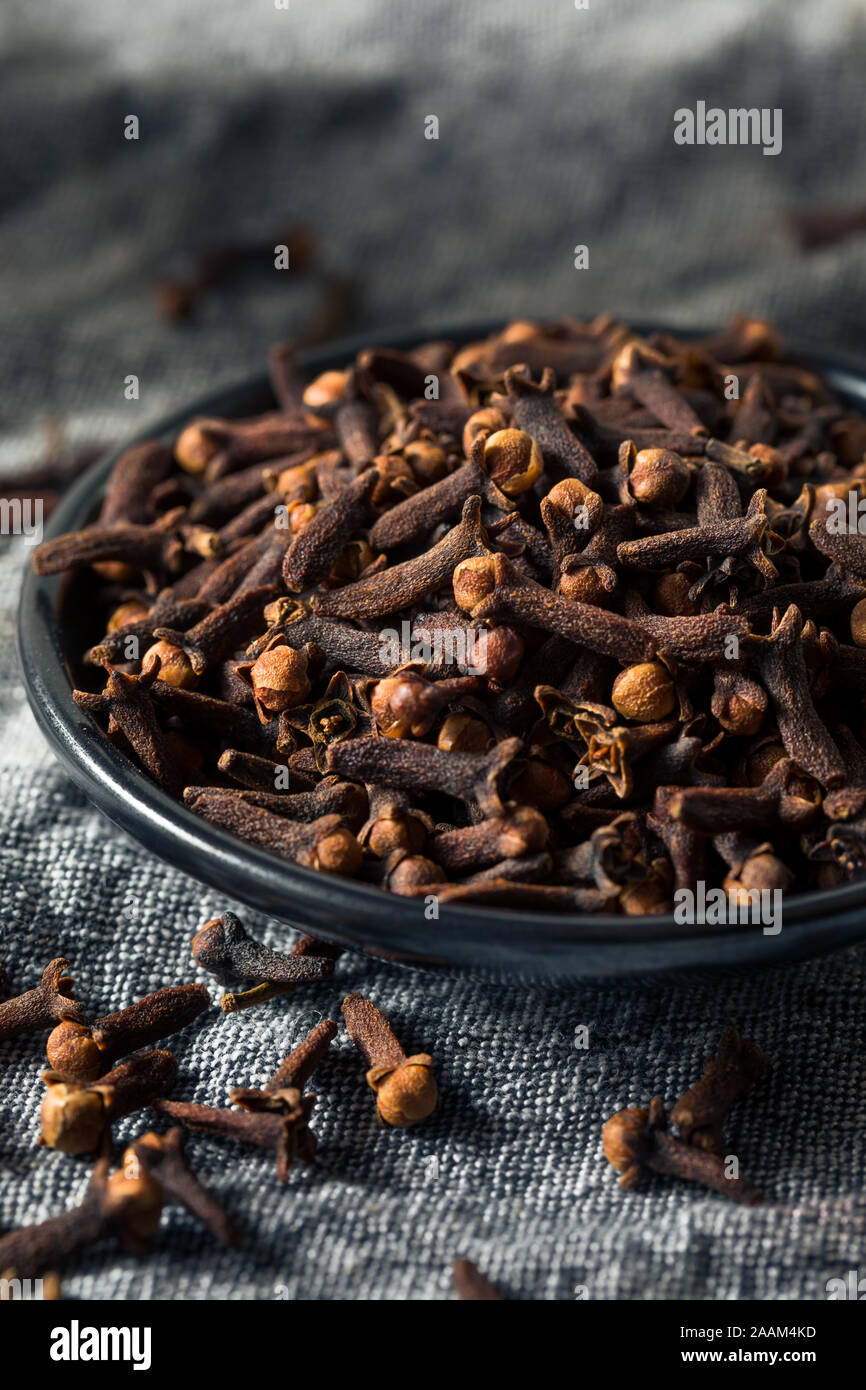 Dry Organic Clove Spice in a Bowl Stock Photo