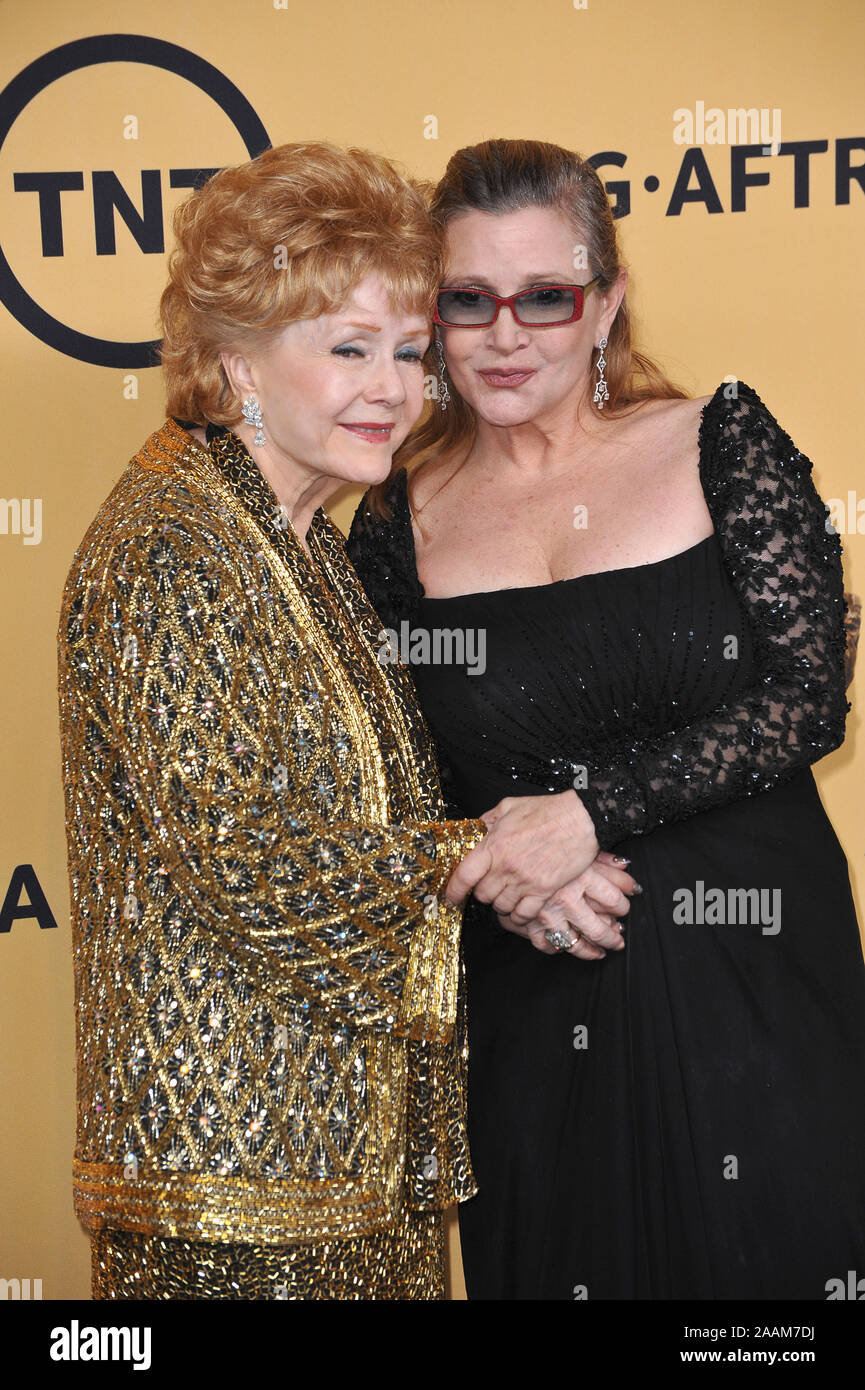 LOS ANGELES, CA - JANUARY 25, 2015: Debbie Reynolds & daughter Carrie Fisher at the 2015 Screen Actors Guild  Awards at the Shrine Auditorium. © 2016 Paul Smith / Featureflash Stock Photo