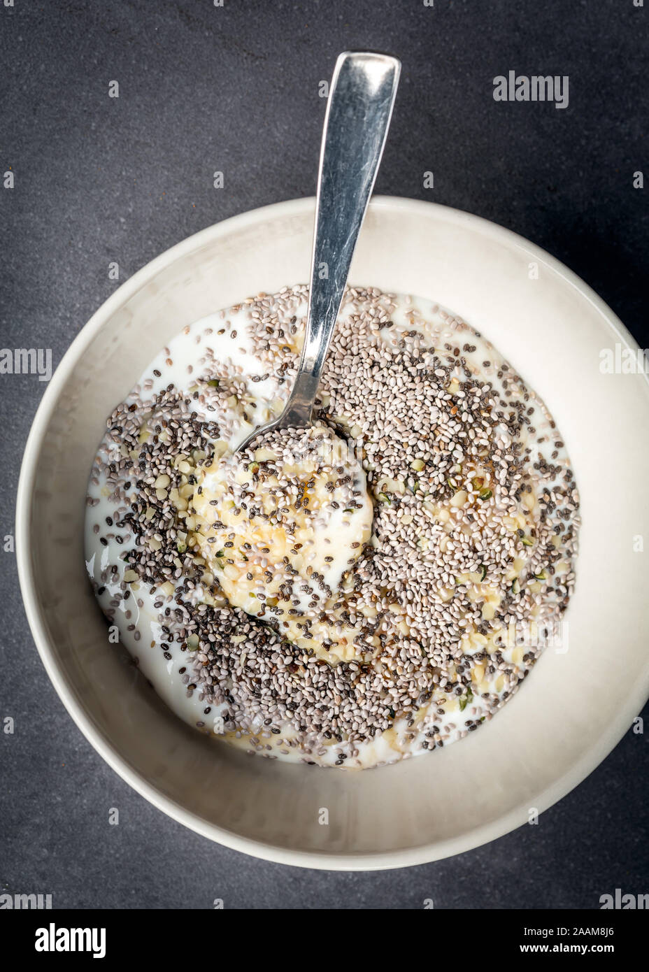 Yogurt with hemp seeds, honey and chia seeds Stock Photo Alamy