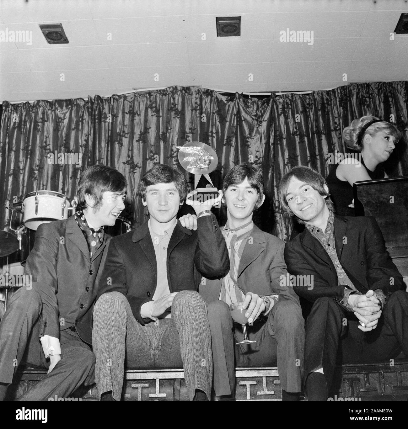 2nd February 1967. The English Pop group The Small Faces collecting an award. Members include Steve Marriott, Ronnie Lane, Kenney Jones, and Ian McLagan. Stock Photo