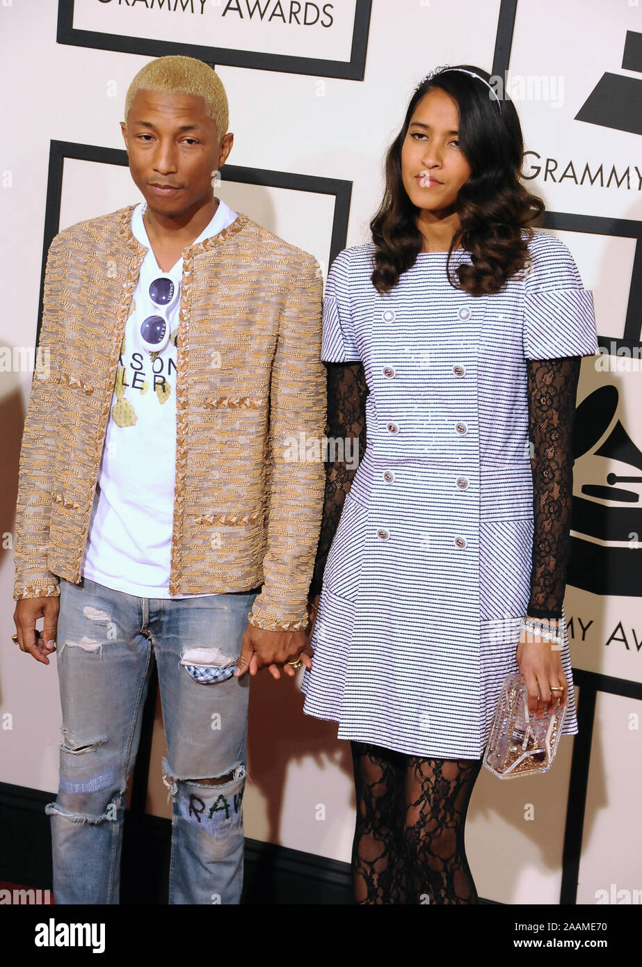 LOS ANGELES, CA. February 15, 2016: Pharrell Williams & wife Helen  Lasichanh at the 58th Annual Grammy Awards at the Nokia Theatre LA Live. ©  2016 Paul Smith / Featureflash Stock Photo - Alamy