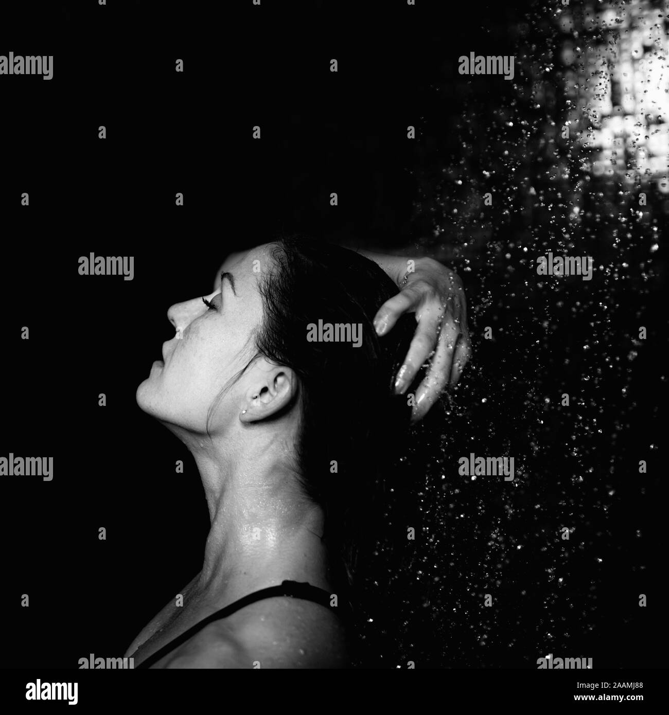 Woman taking a shower hi-res stock photography and images - Alamy