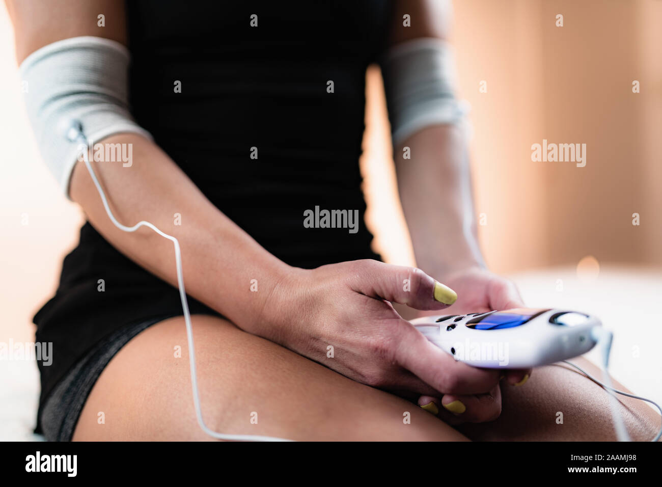 Physical therapy with TENS machine Stock Photo - Alamy