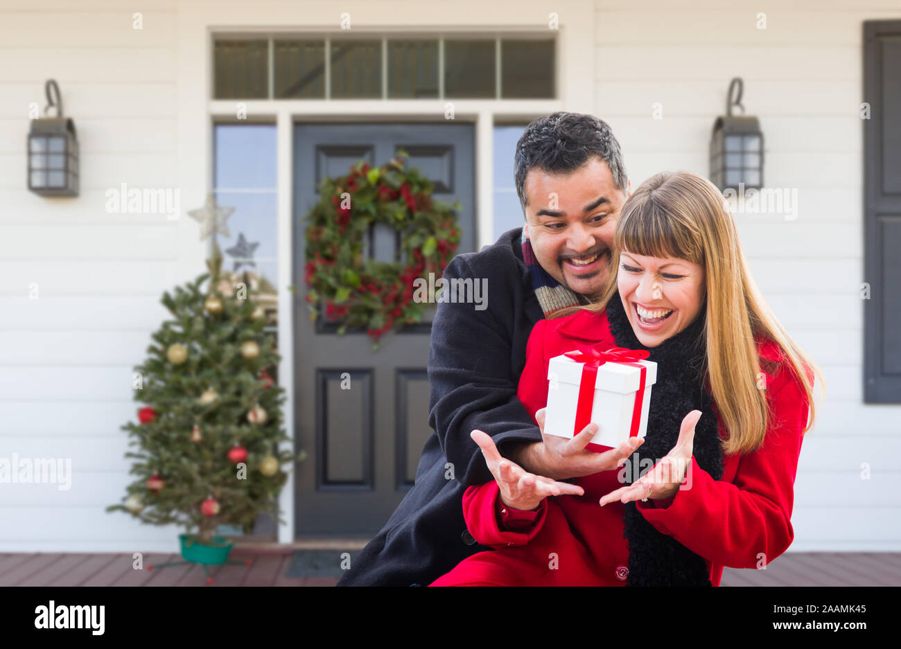 Portrait happy couple on porch hi-res stock photography and images - Alamy
