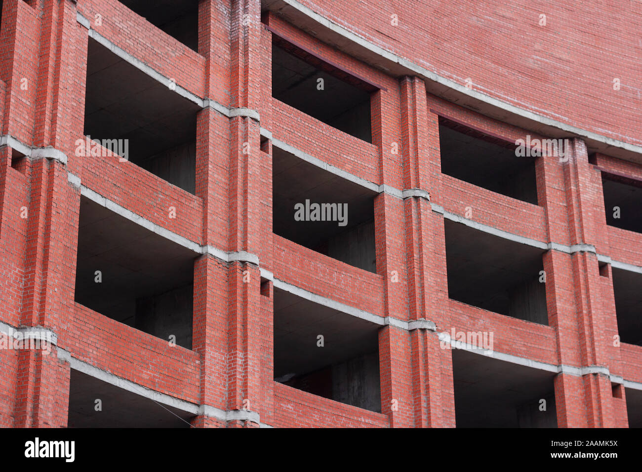 high-rise brick building. construction structure developmen site Stock