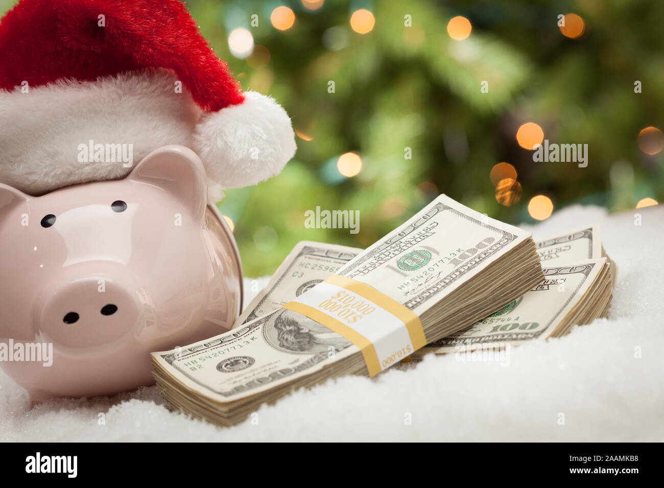 Piggy Bank Wearing Santa Hat Near 