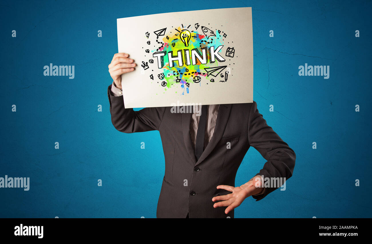 Young person holding paper with design thinking concept Stock Photo - Alamy