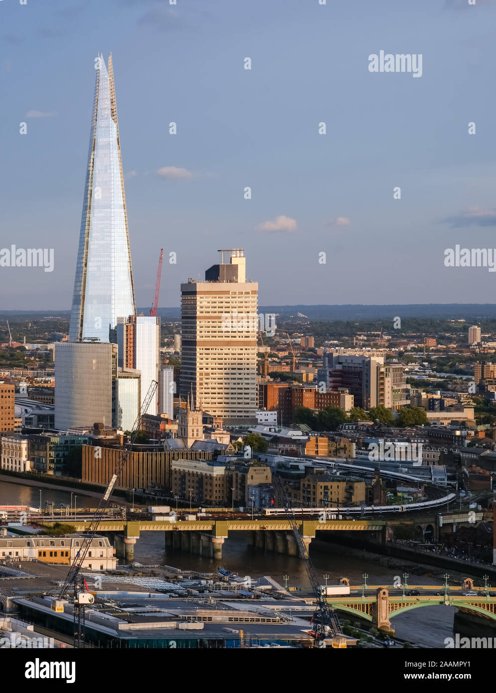 A view of the Shard and South London. A train line can be seen running out of London Bridge railway Station Stock Photo