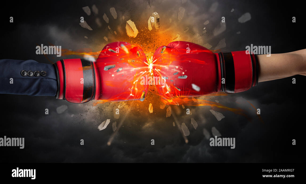 Two hands fighting and breaking a rock into small pieces Stock Photo ...