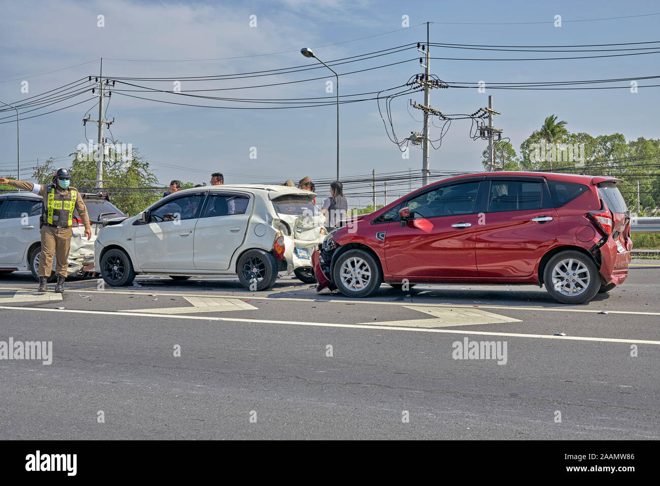 Car accident, driving to close, failure to stop, vehicle collision, Multi car collision, Thailand, Southeast Asia, front and rear damage Stock Photo