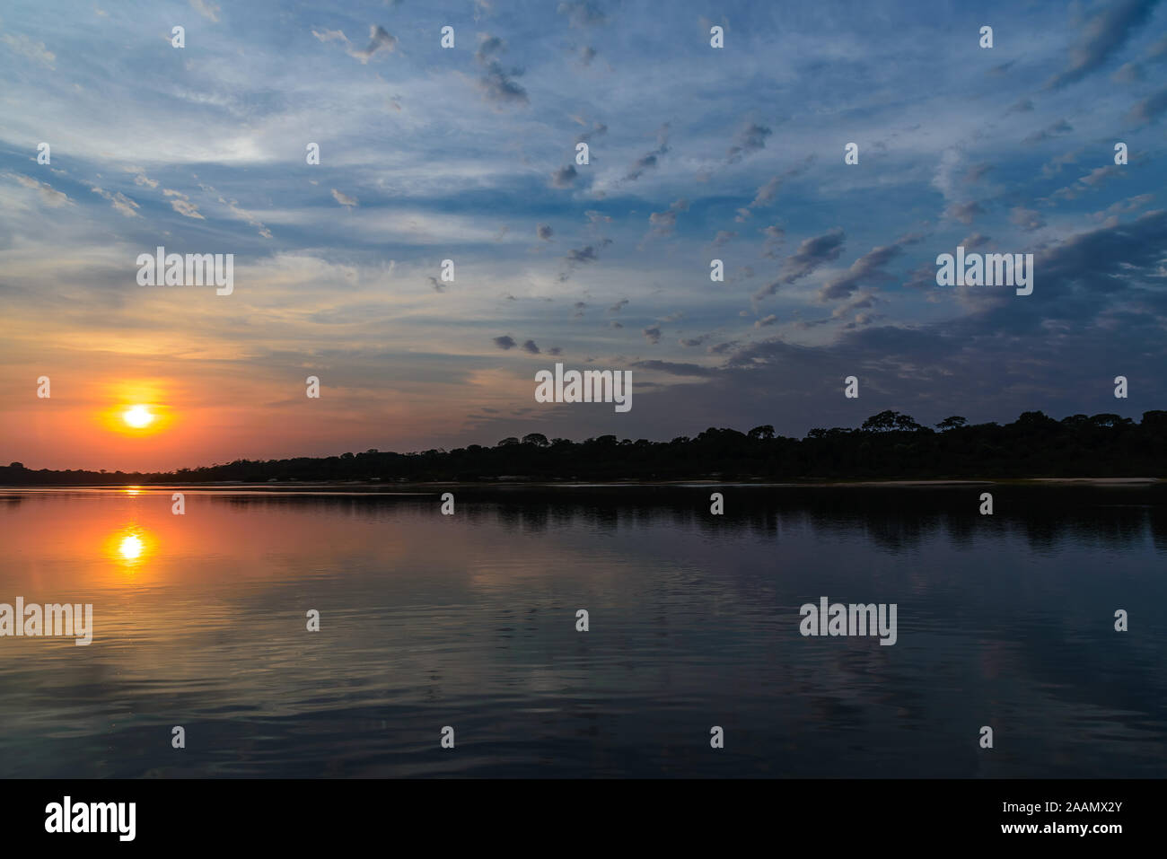 Sunset over Rio Araguaia, a major tributary in the Amazon Basin. Tocantins, Brazil, South America. Stock Photo
