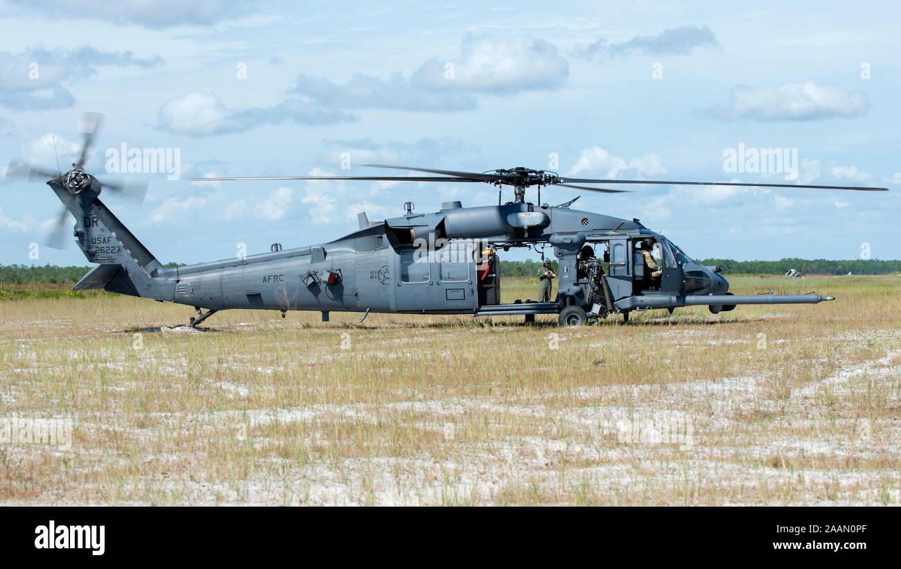 An HH-60 Pave Hawk helicopter assigned to the 305th Rescue Squadron (RQS), Davis-Monthan Air Force Base, Ariz., idles at Avon Park Air Force Range, Fla., Nov. 8, 2019. MacDill Air Force Base hosted the 305th RQS and Special Forces for an exercise at Avon Park. (U.S Air Force photo by Airman 1st Class Ryan C. Grossklag) Stock Photo