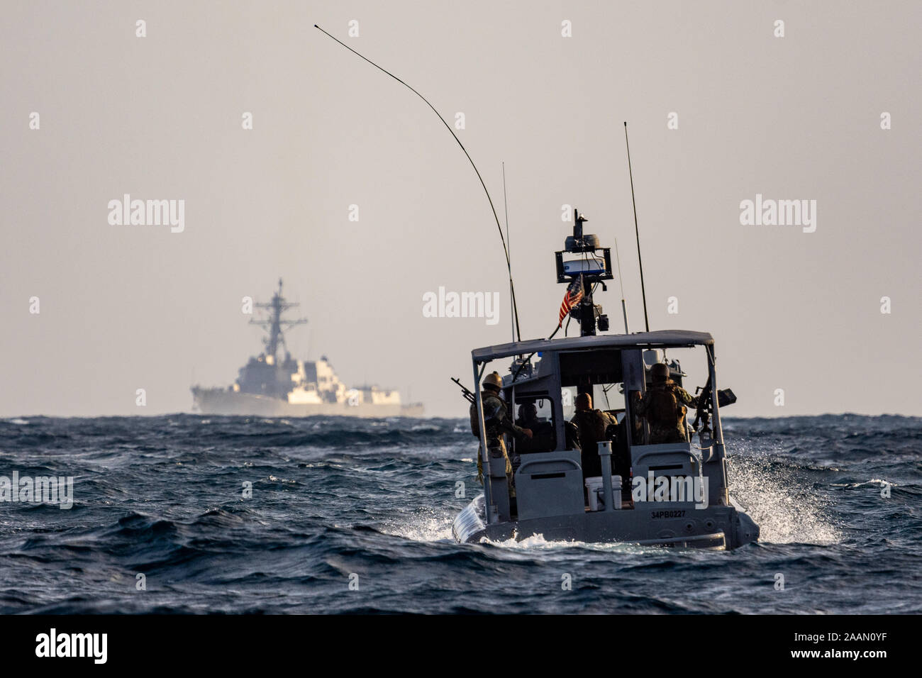 191117-N-DX868-1378 GULF OF TADJOURA (November 17, 2019) Sailors assigned to Coastal Riverine Squadron (CRS) 1 man a 34-foot Dauntless class patrol boat to rendezvous with the USS Forrest Sherman DDG 98. CRS-1 is forward-deployed with Combined Task Group 68.6 at Camp Lemonnier, Djibouti. (U.S. Navy photo by Hospital Corpsman 1st Class Kenji Shiroma/Released) Stock Photo