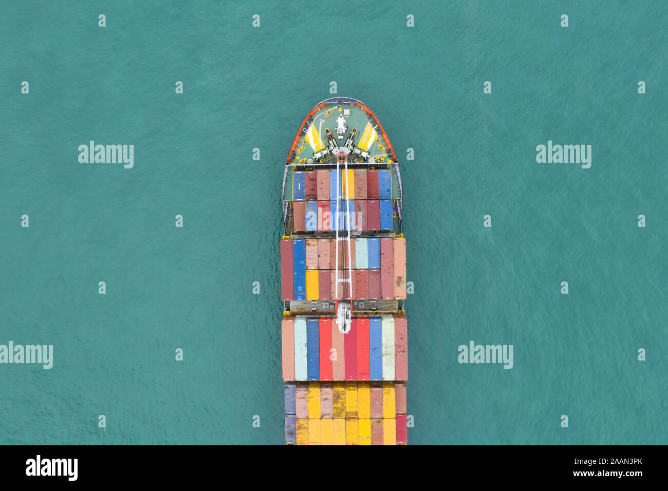 View from above, stunning aerial view of a cargo ship sailing with