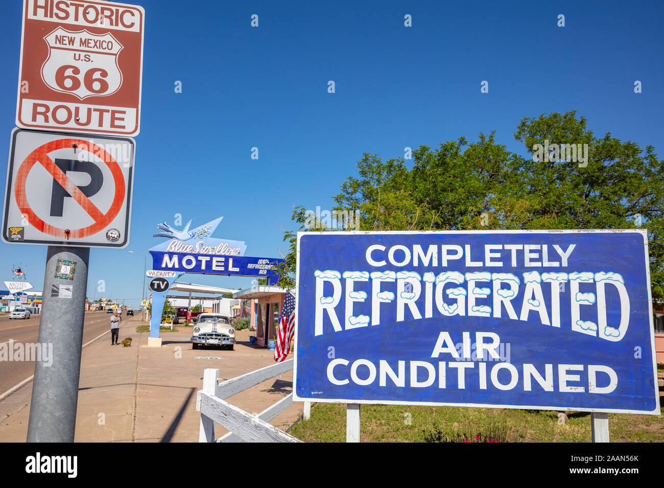 Tucumcari, New Mexico, USA. May 14, 2019. Motel Blue Swallow next to route 66. A pontiac car is parked at the entrance. Signs inform tourists about th Stock Photo