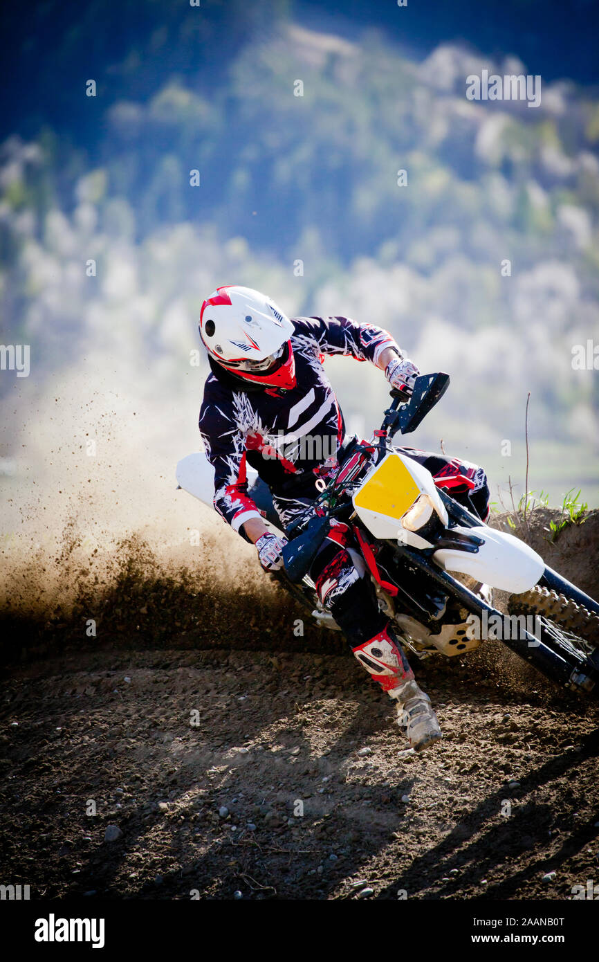 moto cross in action in dirt road Stock Photo