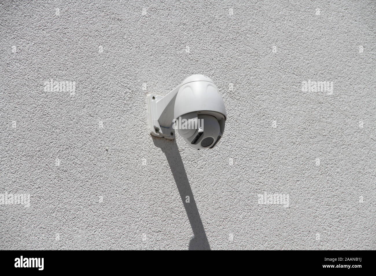Security camera on a house wall Stock Photo