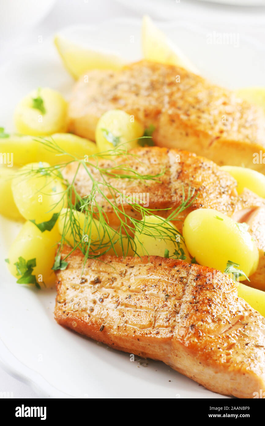 Slices of Fried Salmon with Boiled Potatoes Stock Photo