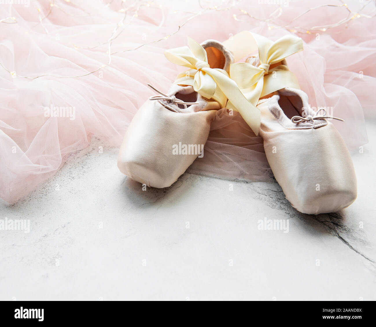 Pointe Ballet Shoes on white wooden background Stock Photo
