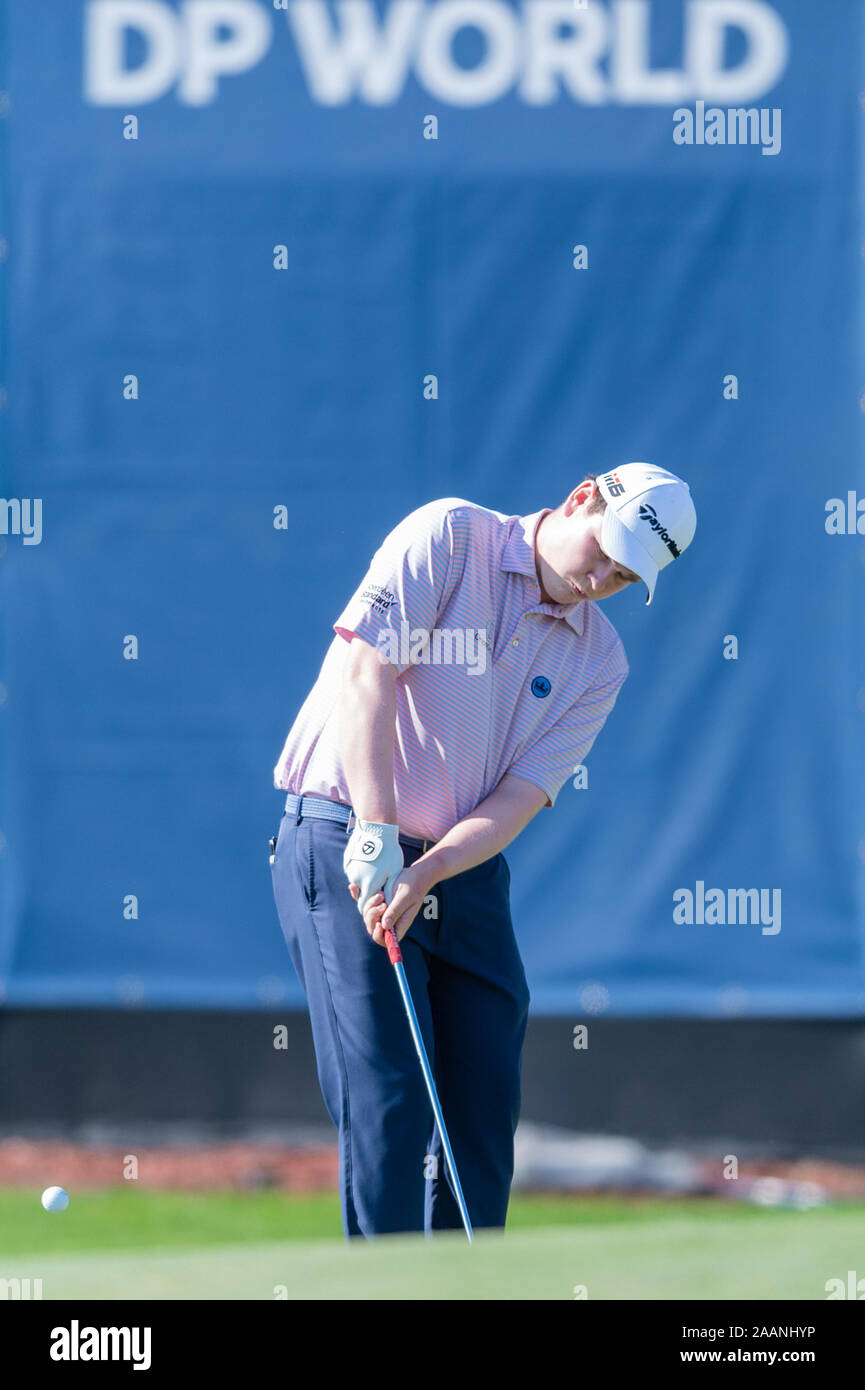 Dubai, UAE. 23rd Nov 2019. Robert Macintyre of Scotland chips in at the  first hole in round 3 during the DP World Tour Championship at Jumeirah Golf  Estates, Dubai, UAE on 22