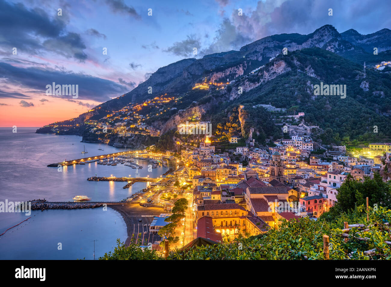 The beautiful village of Amalfi in Italy at sunset Stock Photo