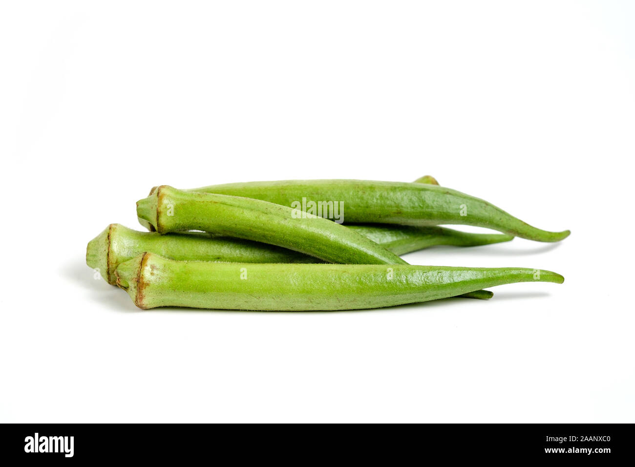 Ladies' fingers or Okra vegetable on white isolated background Stock Photo