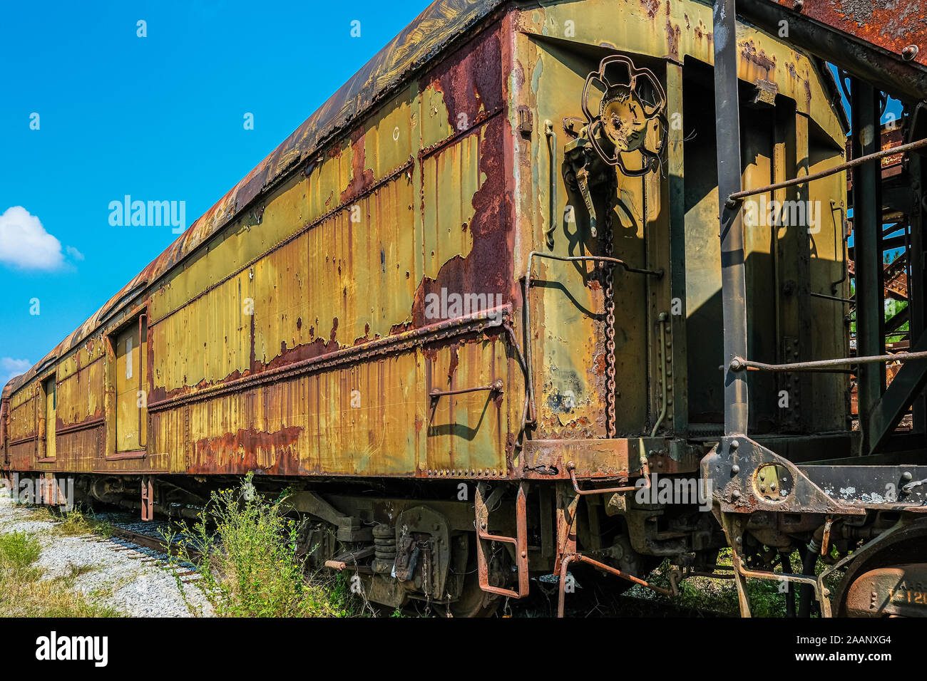 Rust on Yellow Train Stock Photo - Alamy