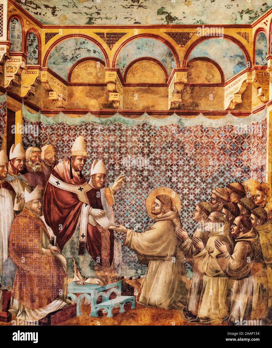 A fresco painting in the upper Basilica of Assisi, probably a work by Giotto di Bondone (1266-1337) shows Saint Francis of Assisi receiving confirmation of the admission of his religious community in 1210 from Pope Innocent III. Stock Photo