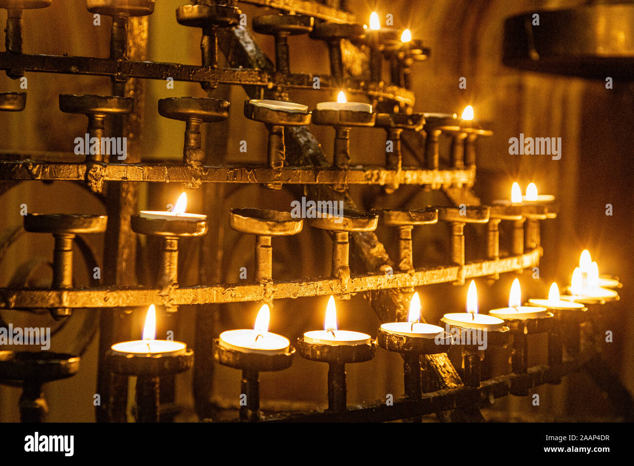 Prayer or Votive Candles Burning on a Stand In St Giles' Cathedral