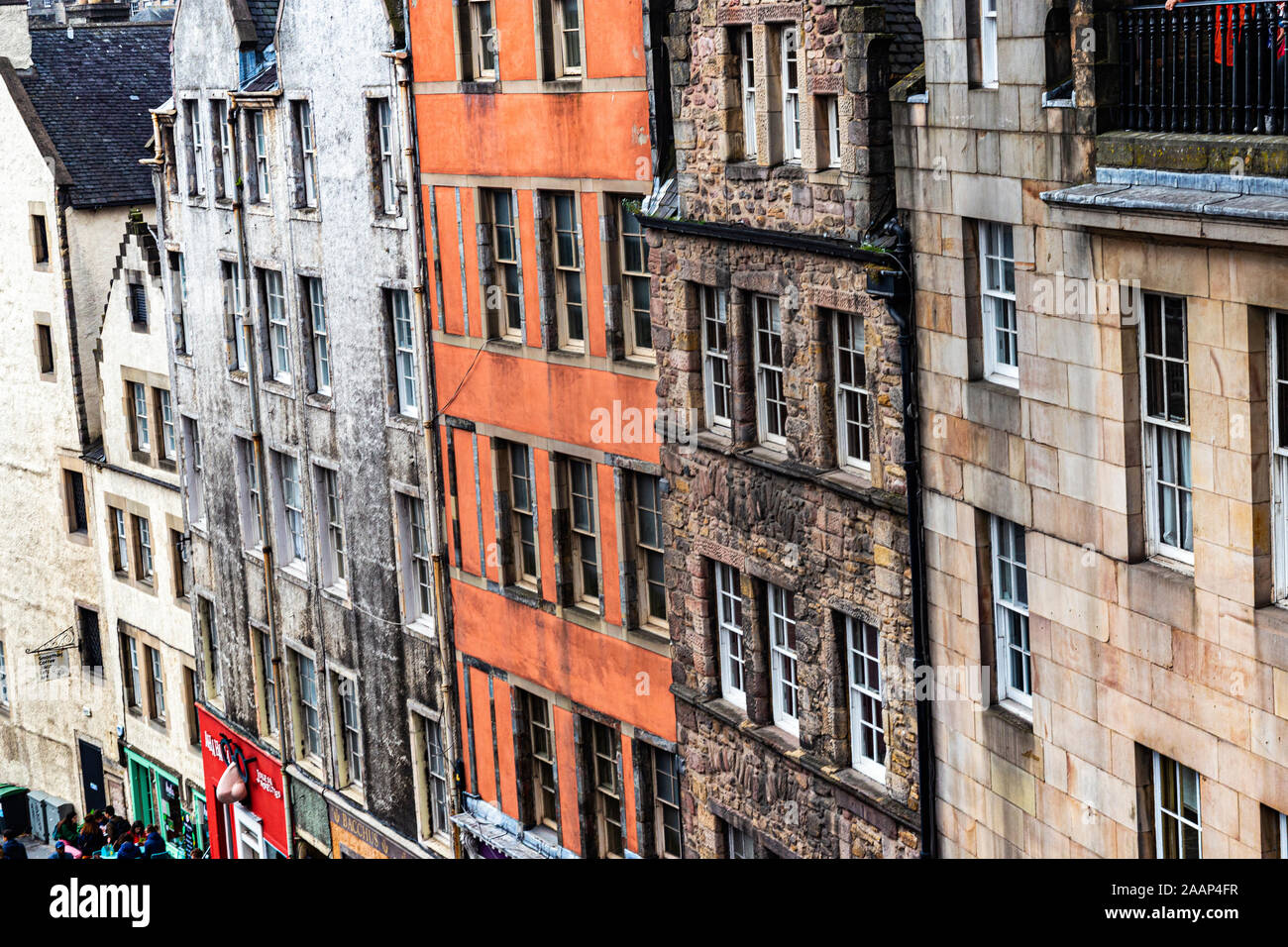 Close up Detail of Edinburgh’s Famous West Bow & Victoria Street Buildings Showing Bright Coloured Facades, Environmental Degradation and Stonework on Stock Photo
